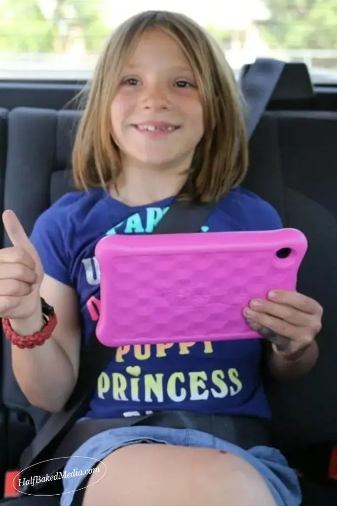 The Ellie Sparkles Show: A Parents Review with 2026 Updates 11 Madisyn Worden Jenn Brockman's daughter in the car with tablet