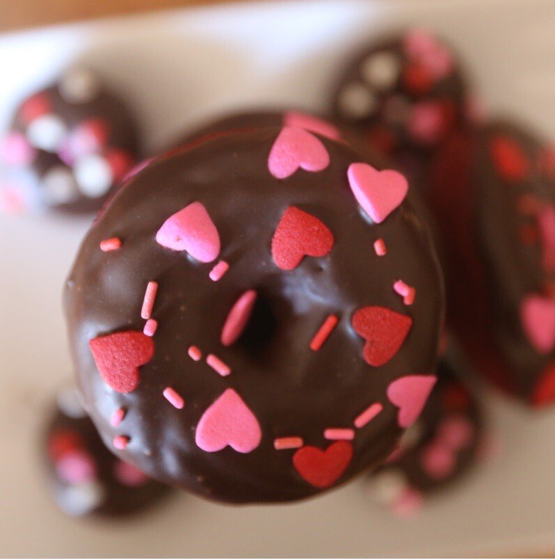 Valentine’s Day Candied Popcorn 14 Baked Red Velvet Donuts with Chocolate Frosting