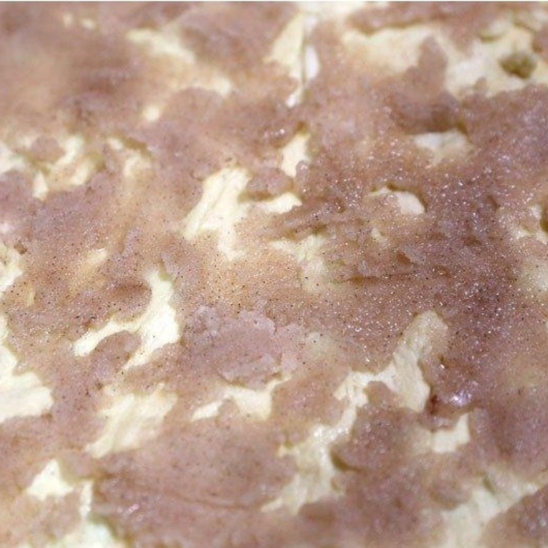 M&M Sopapilla Cheesecake Bars Recipe 16 topping spread over sopapilla