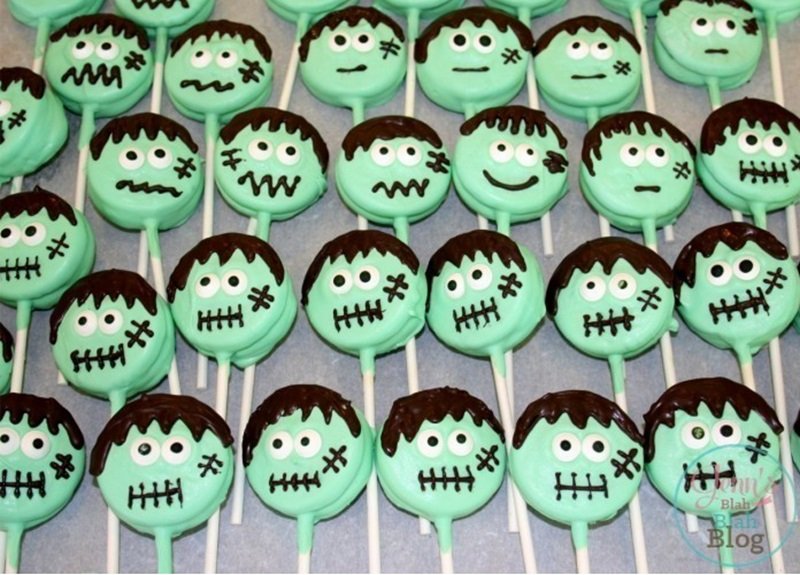 Mummy & Frankenstein Oreo Cookie Pops 16 Frankenstein Oreo Cookie Pops laying on wax paper