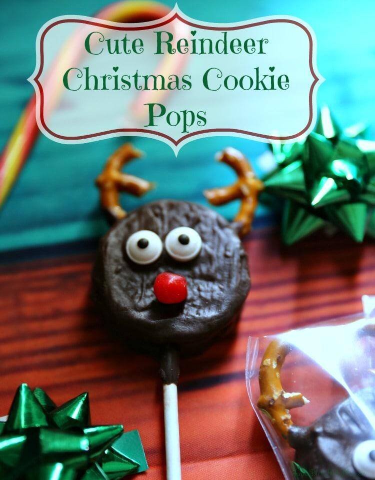 How to Make Reindeer Christmas Cookie Pops 10 Reindeer Christmas Cookie Pops on counter with bow