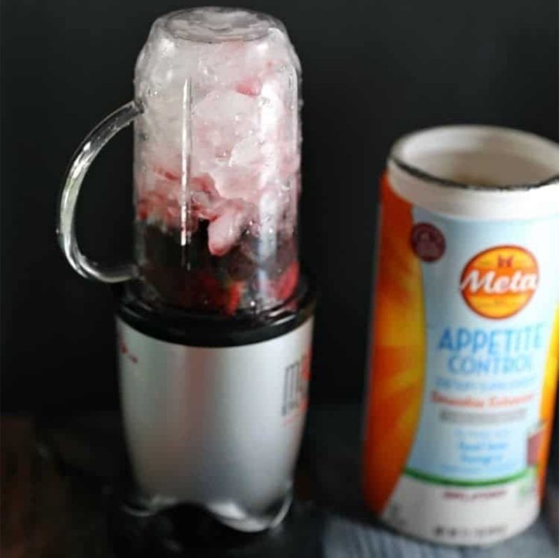ice yogurt and blackberries in magic bullet