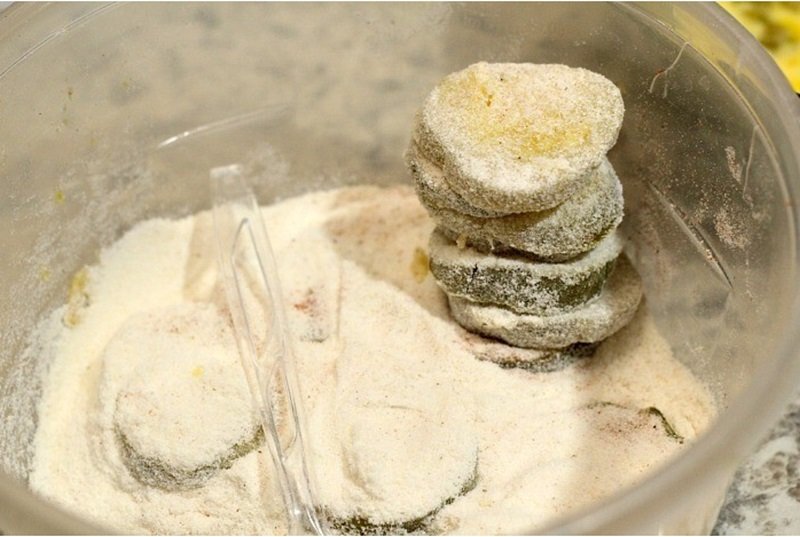 How To Make Tasty Fried Pickles 16 sliced pickles covered in corn meal