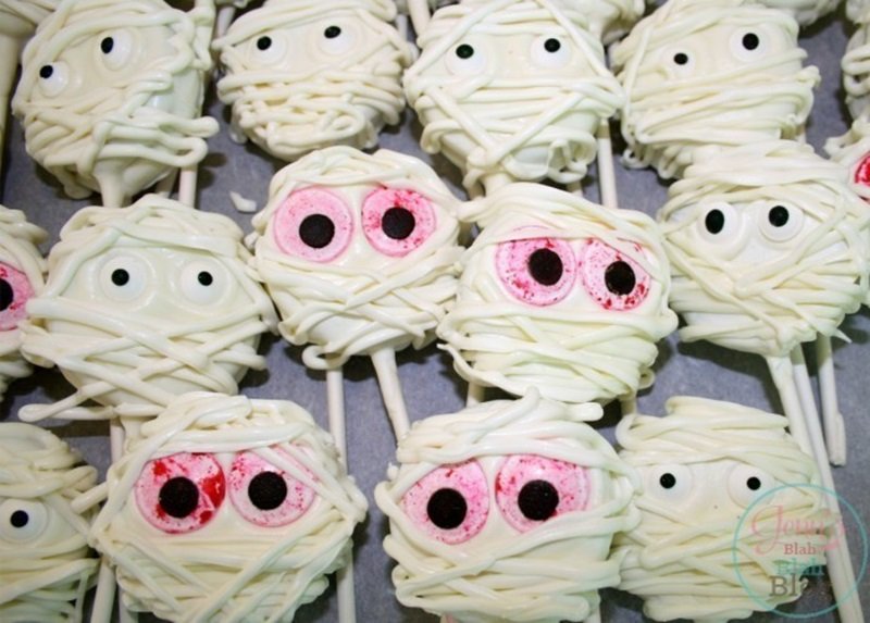 Mummy & Frankenstein Oreo Cookie Pops 17 Mummy Oreo Cookie Pops laying on wax paper