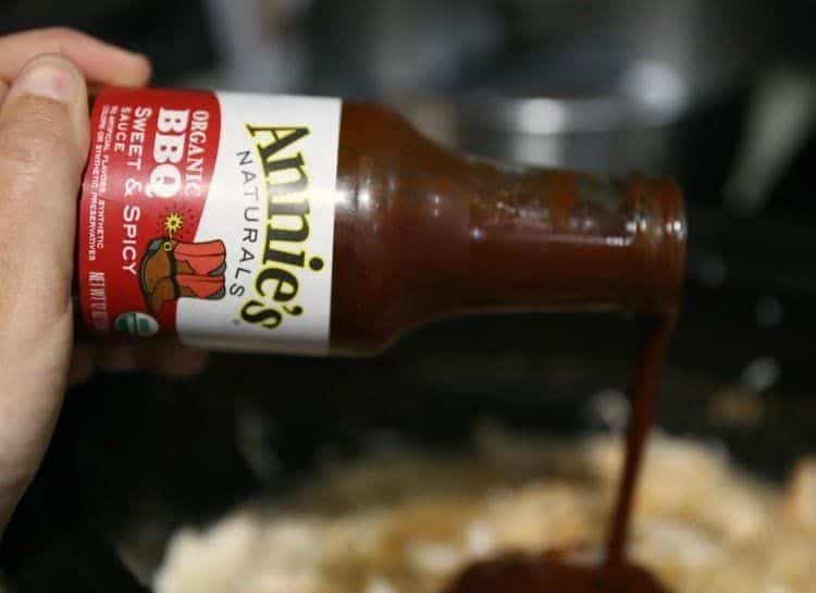 pouring annies barbeque sauce