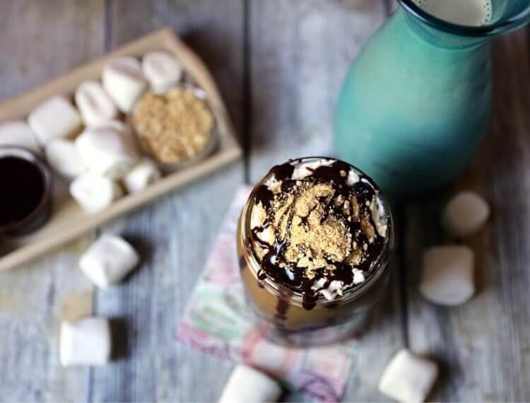 Epic S'more's Iced Coffee 13 S'more's Iced Coffee in mason jar sitting on courter with marshmellows
