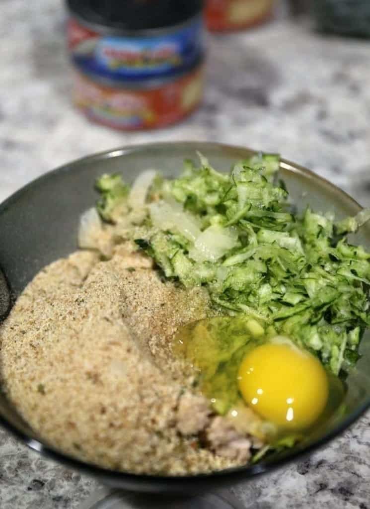 Easy Zucchini Tuna Patties 12 breadcrumbs, eggs, zucchini in a bowl