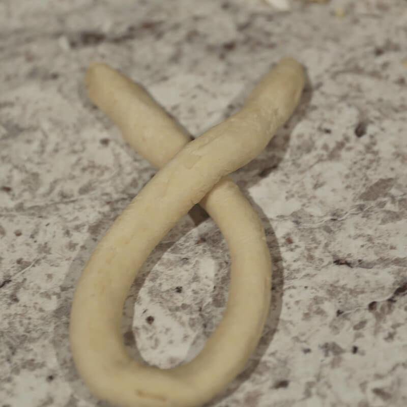 Delicious Homemade Soft Pretzels Stuffed with Brie Cheese 12 folding dough for homemade pretzels