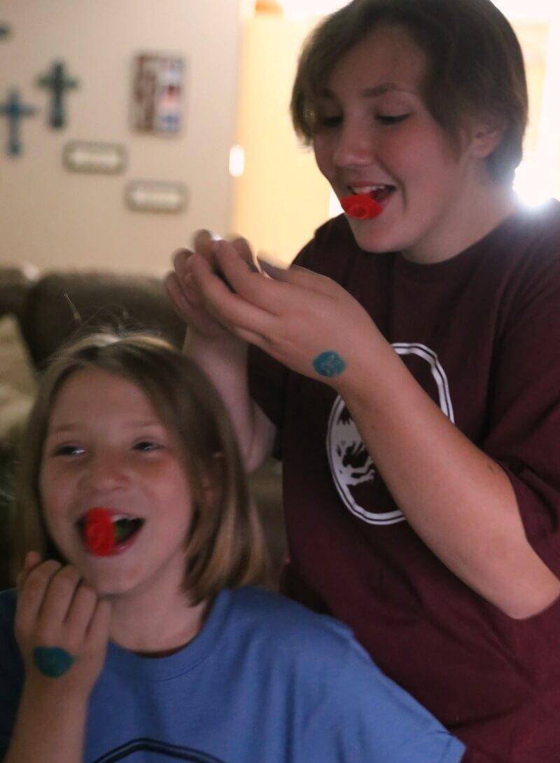 Hard-Boiled Dinosaur Eggs for Jurassic World Movie Night 10 Jennifer brockman's girls eating candy laughing