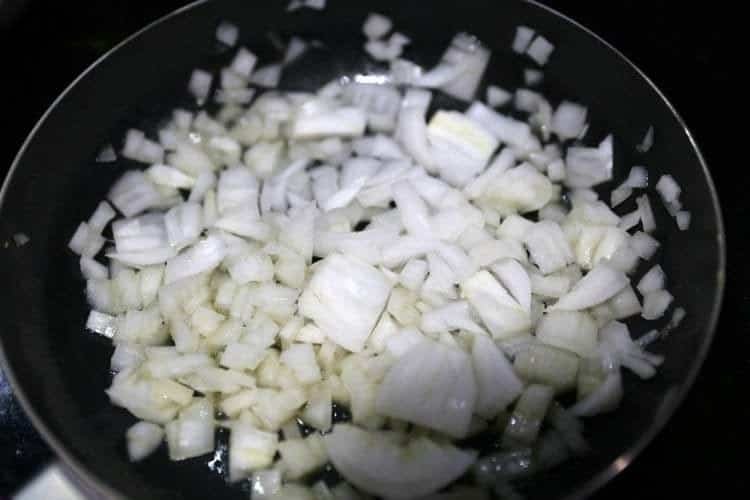 Easy Zucchini Tuna Patties 11 sauté onions in frying pan
