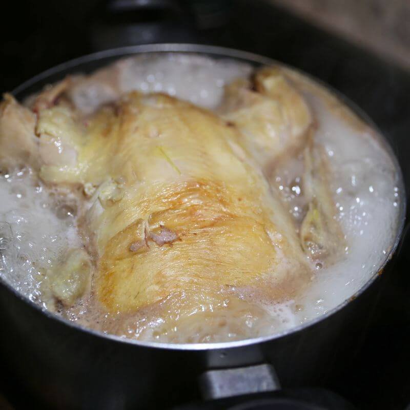 Delish Chicken and Dumplings Recipe 12 Whole chicken boiling
