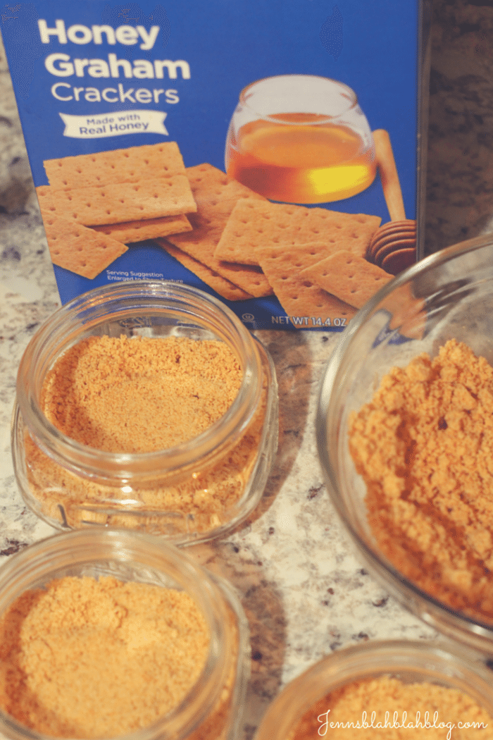 Easy & Delish Mason Jar Key Lime Pies 13 graham crackers packed in the bottom of mason jars