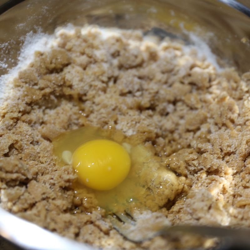 Three Ingredient Peanut Butter Cookies 12 peanut butter egg and sugar in mixing bowl