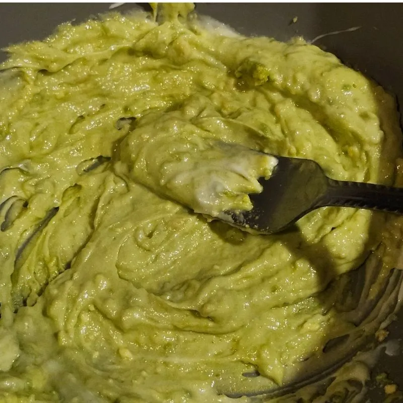 The Ultimate Avocado Tuna Salad Wrap (High-Protein & Low Calorie Lunch) 13 mixing egg yolk, avocado, and light mayo for avocado tuna salad wraps.