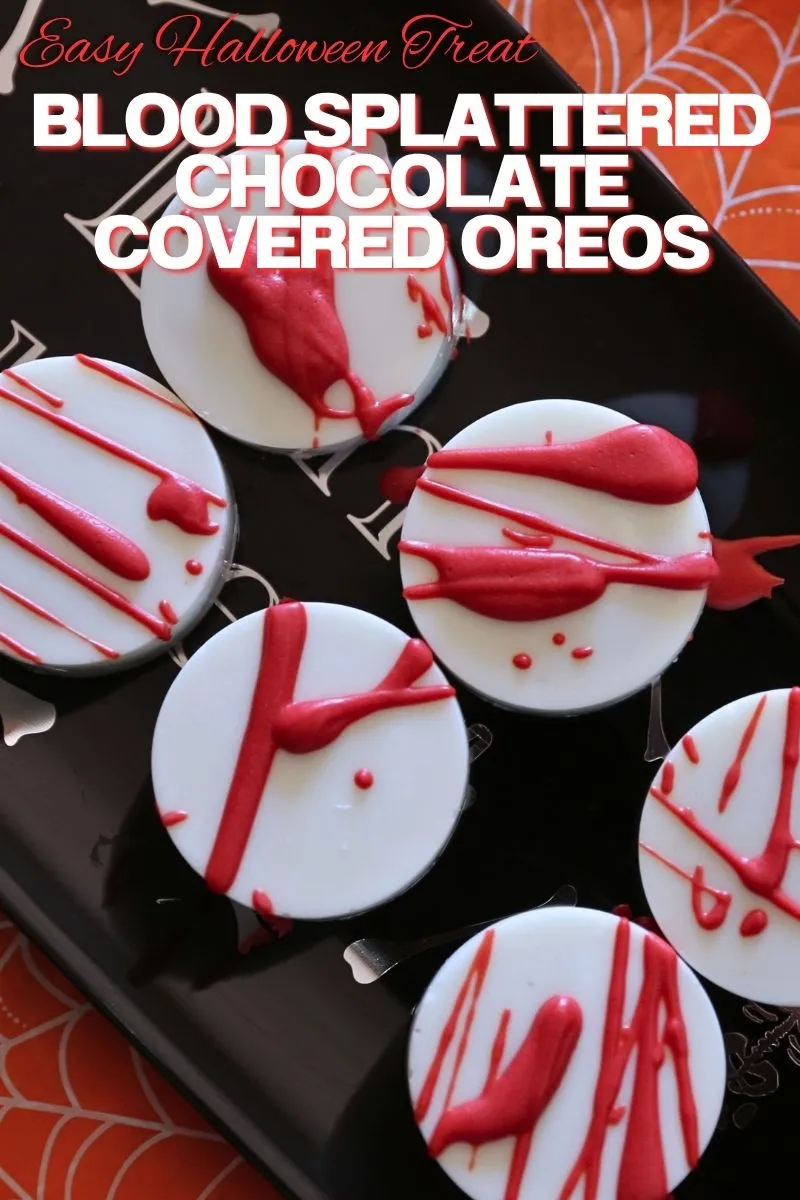 Blood splattered chocolate-covered Oreos arranged on a plate as an easy Halloween treat.