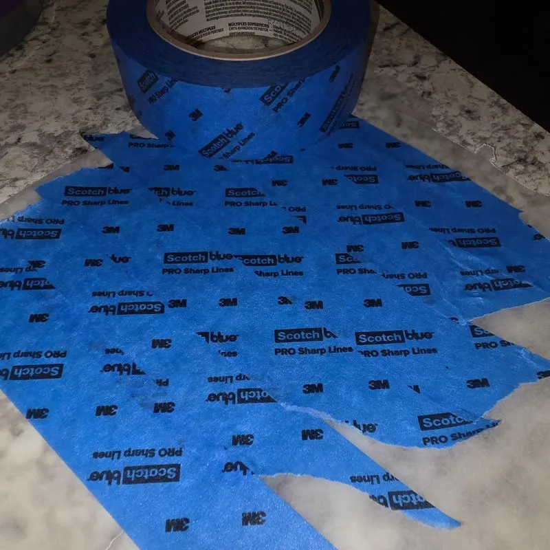 Awesome DIY Dog Treat Jar Using a Mason Jar 12 painters tape on parchment paper to make sticker for mason jar treat jar